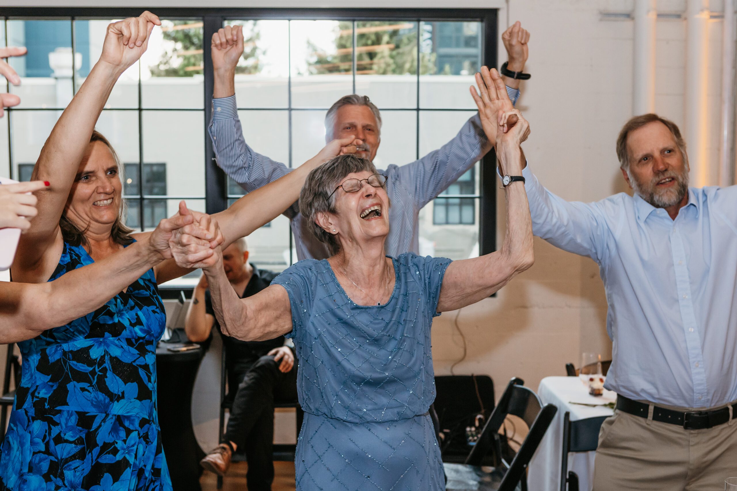 03. The way your 90 year old grannie lit up when her favorite "Sweet Caroline" plays loudly during reception - and everyone in your family joins in the chorus as she laughs & dances freely.